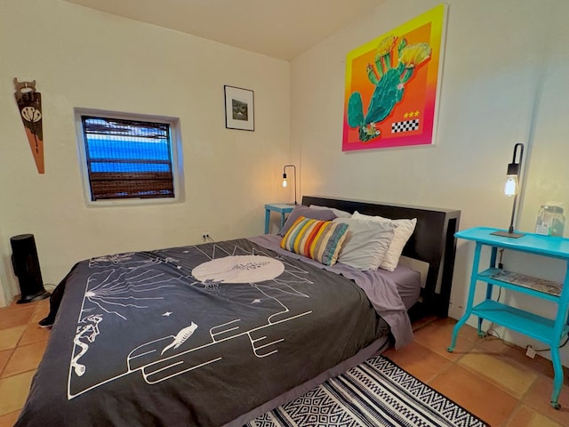 bedroom with tile patterned floors