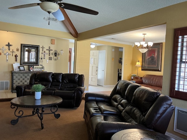 living area with lofted ceiling with beams, visible vents, and a healthy amount of sunlight