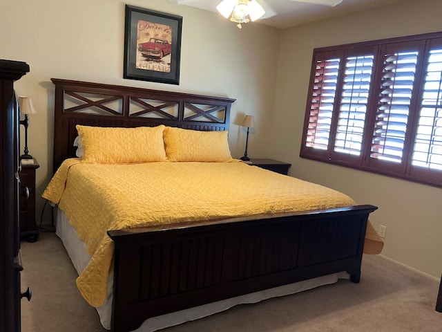 bedroom with light colored carpet