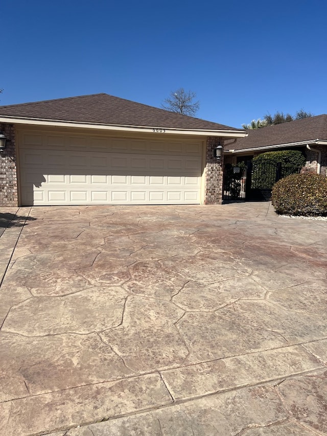 exterior space with concrete driveway