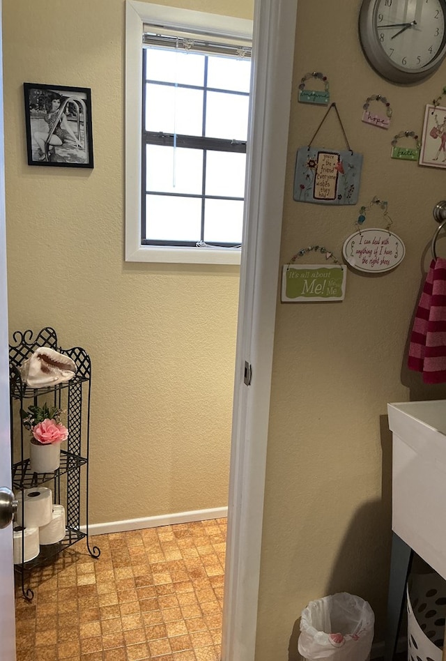 bathroom featuring baseboards