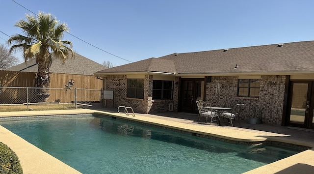 view of pool featuring fence, a patio area, and a fenced in pool