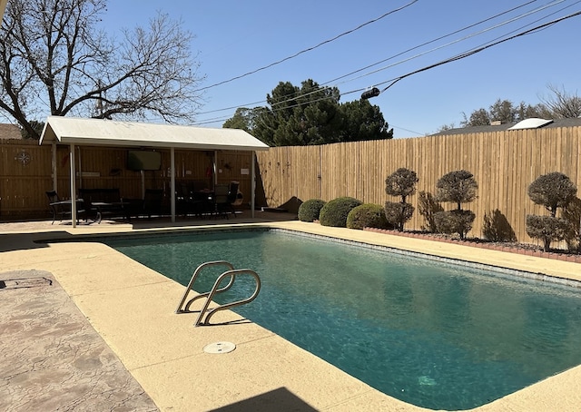 view of pool featuring a patio area, a fenced backyard, and a fenced in pool