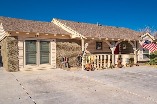 exterior space featuring a porch and a patio