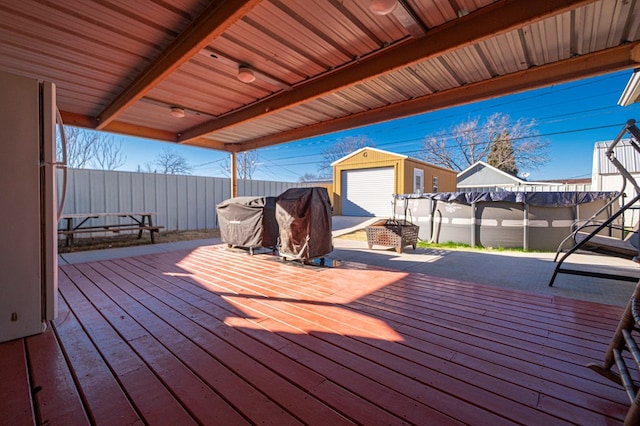 deck featuring a storage shed