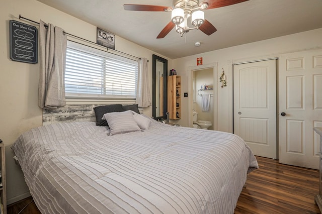 bedroom featuring ceiling fan, ensuite bathroom, dark hardwood / wood-style flooring, and a closet