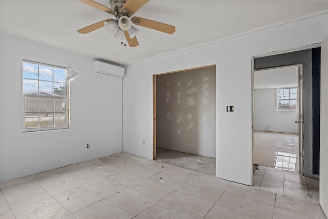 8528 W 24th St, Odessa, TX 79763 - unfurnished bedroom with a wall mounted AC, ceiling fan, and a closet
