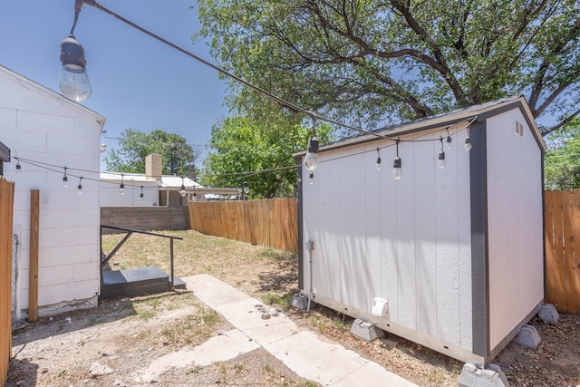2707 Eisenhower Rd, Odessa, TX 79762 - fenced backyard with a storage unit