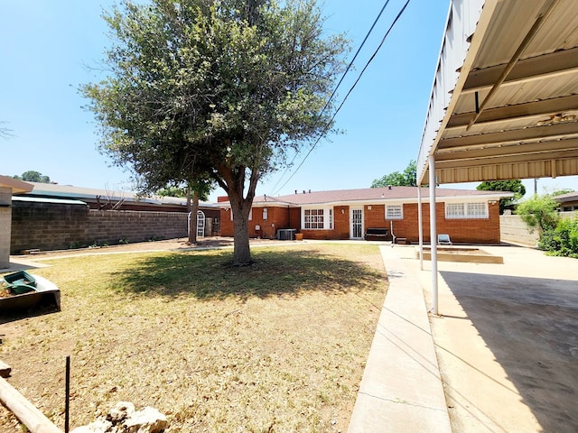 2104 Redbud Ave, Odessa, TX 79761 - view of yard with cooling unit and a patio area