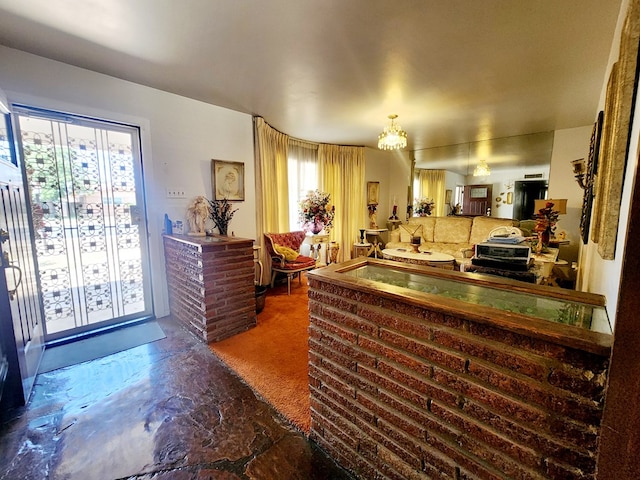 2104 Redbud Ave, Odessa, TX 79761 - kitchen featuring a chandelier