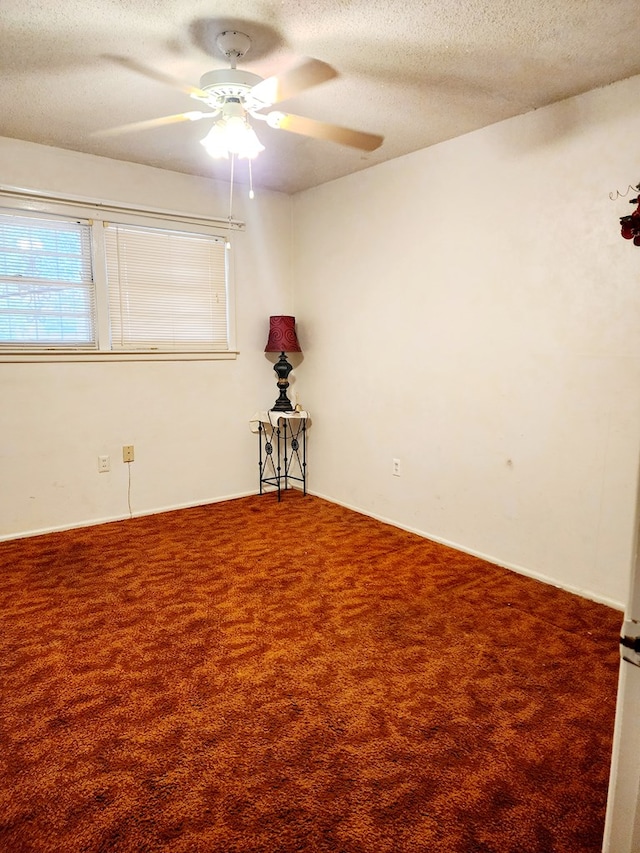 2104 Redbud Ave, Odessa, TX 79761 - carpeted spare room featuring a textured ceiling and a ceiling fan