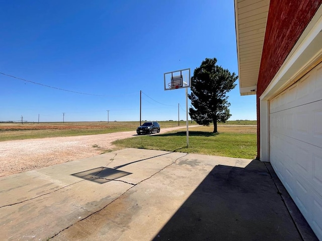 view of patio / terrace featuring driveway