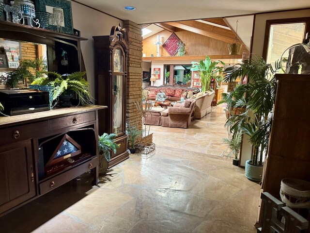 2500 Bainbridge Dr, Odessa, TX 79762 - living room featuring stone tile flooring and wood walls