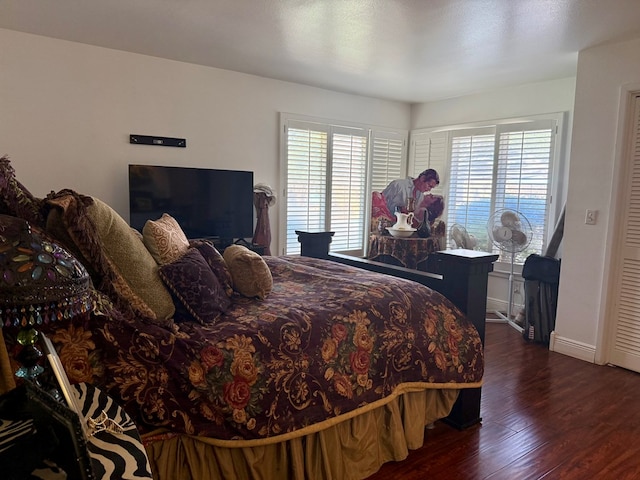 2500 Bainbridge Dr, Odessa, TX 79762 - bedroom featuring wood finished floors and baseboards