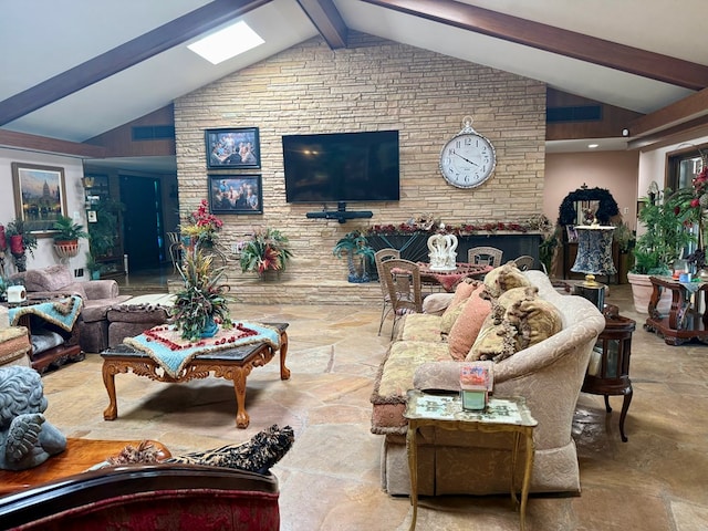 2500 Bainbridge Dr, Odessa, TX 79762 - living area featuring stone finish flooring, beamed ceiling, and high vaulted ceiling