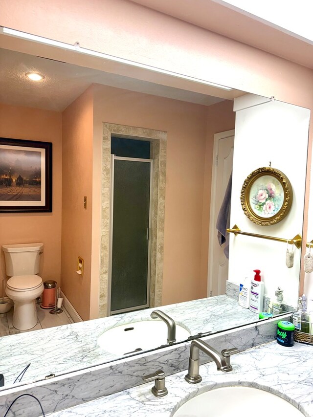 2500 Bainbridge Dr, Odessa, TX 79762 - bathroom with a shower stall and vanity