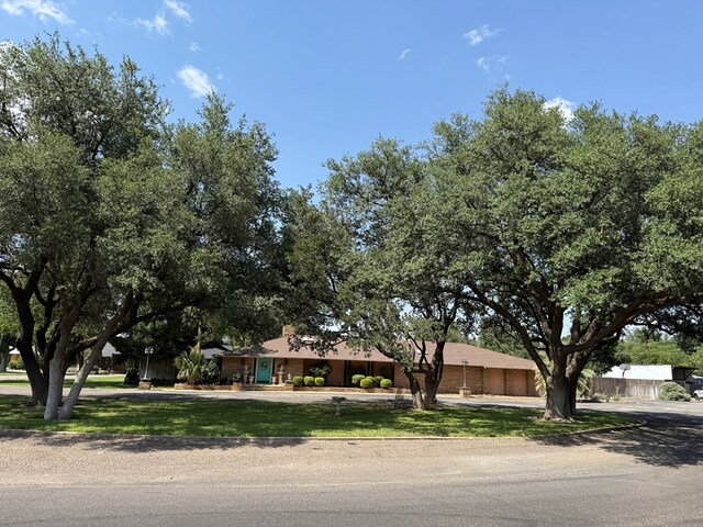 2500 Bainbridge Dr, Odessa, TX 79762 - view of front of property featuring concrete driveway and an attached garage