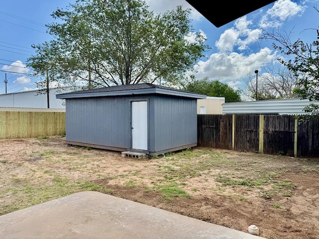 2816 Catalina Dr, Odessa, TX 79764 - fenced backyard featuring a patio and a storage shed