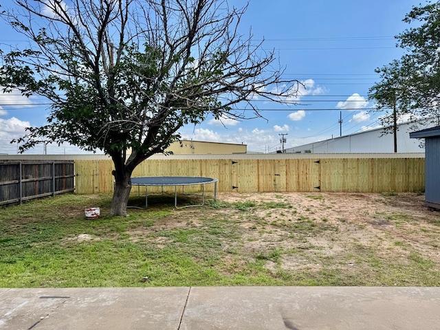 2816 Catalina Dr, Odessa, TX 79764 - fenced backyard with a trampoline