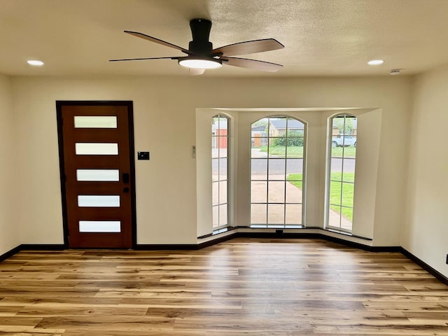 2816 Catalina Dr, Odessa, TX 79764 - foyer entrance with wood finished floors, a ceiling fan, and recessed lighting