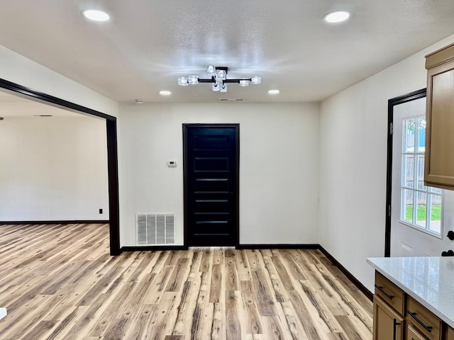 2816 Catalina Dr, Odessa, TX 79764 - unfurnished room featuring light wood-style floors and recessed lighting