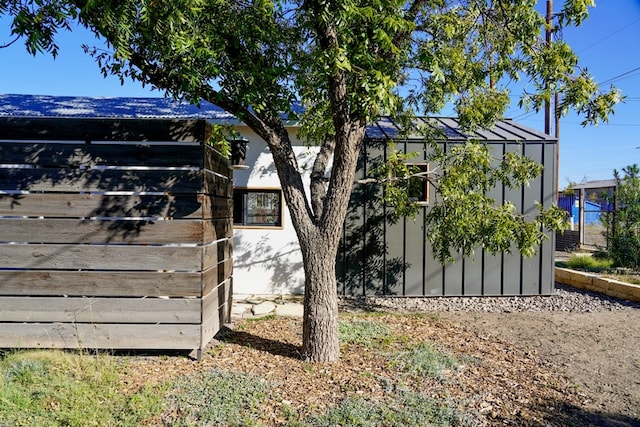 1109 E Murphy St, Marfa, TX 79843 - view of side of property with an outbuilding