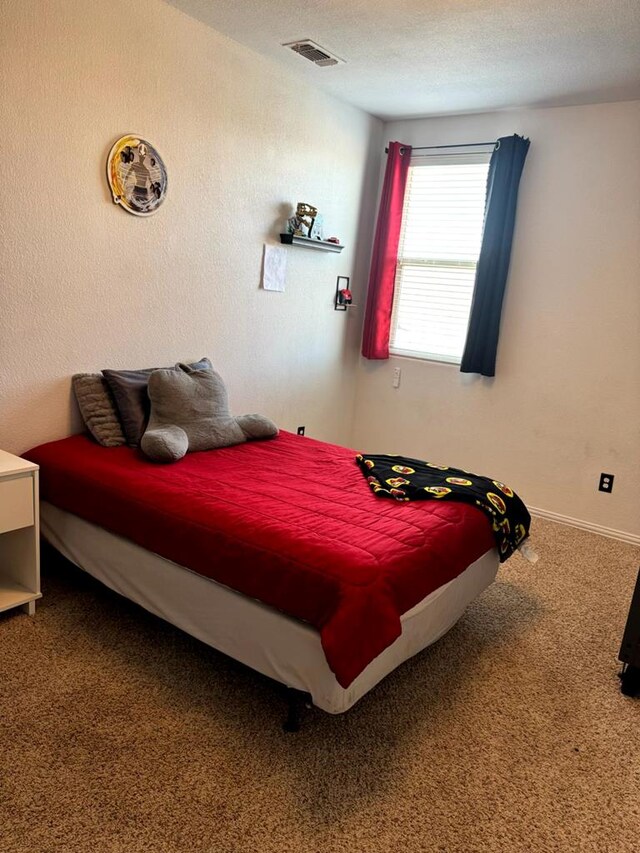7012 Perot Ranch Rd, Odessa, TX 79765 - carpeted bedroom with baseboards