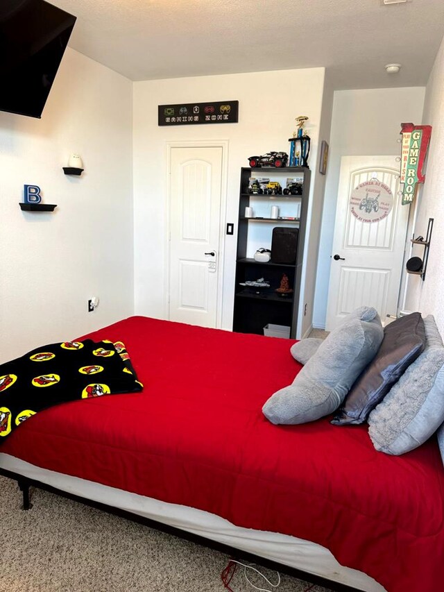 7012 Perot Ranch Rd, Odessa, TX 79765 - bedroom with carpet flooring