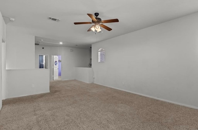 7012 Perot Ranch Rd, Odessa, TX 79765 - carpeted empty room featuring attic access, a ceiling fan, baseboards, and a smoke detector