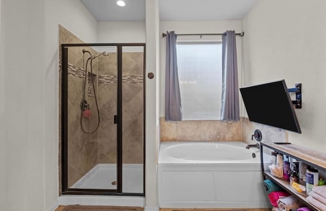 7012 Perot Ranch Rd, Odessa, TX 79765 - bathroom with a shower stall and a garden tub
