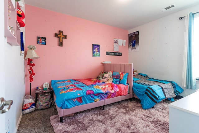 bedroom featuring carpet