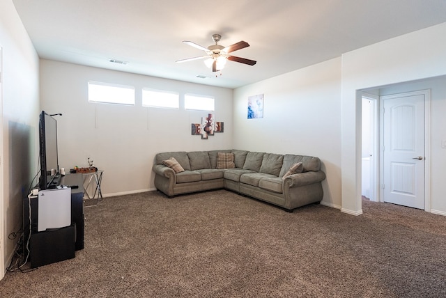 living room with dark colored carpet and ceiling fan