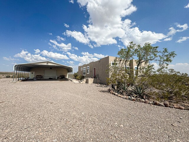 1500 Rancho Rd, Presidio, TX 79845 - view of home's exterior featuring a carport