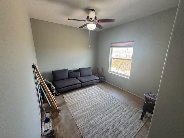 1500 Rancho Rd, Presidio, TX 79845 - sitting room featuring ceiling fan, wood finished floors, and baseboards