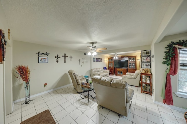 104 E 3rd St, Marfa, TX 79843 - living area featuring light tile patterned floors, a ceiling fan, and a textured ceiling