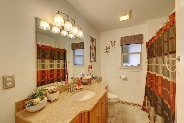 104 E 3rd St, Marfa, TX 79843 - full bath with tile patterned flooring, curtained shower, toilet, and vanity