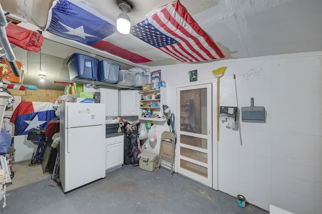 104 E 3rd St, Marfa, TX 79843 - interior space with freestanding refrigerator