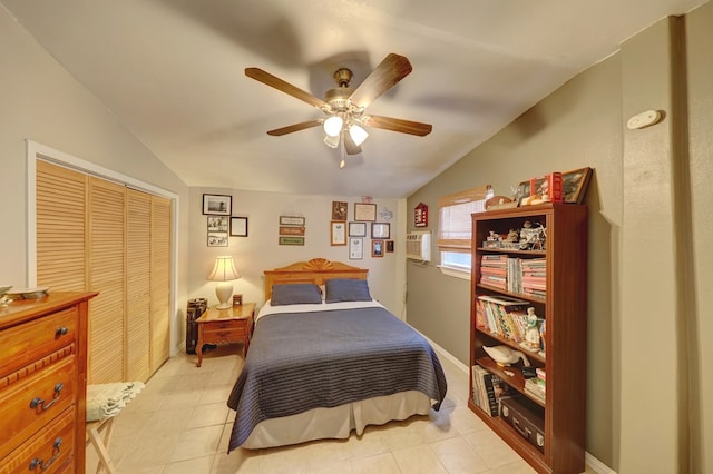 104 E 3rd St, Marfa, TX 79843 - bedroom with a closet, lofted ceiling, ceiling fan, a wall mounted AC, and light tile patterned floors