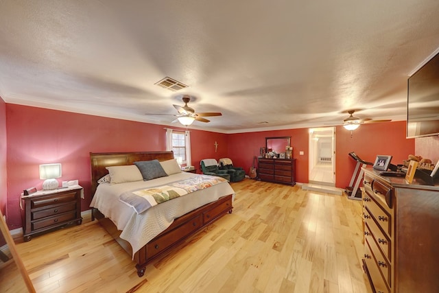 104 E 3rd St, Marfa, TX 79843 - bedroom with visible vents, light wood-style flooring, and baseboards