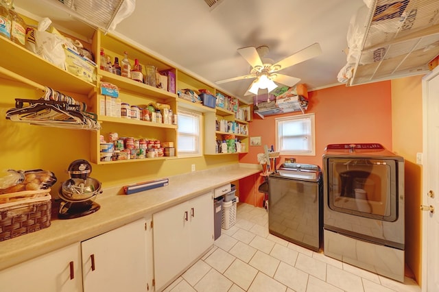 104 E 3rd St, Marfa, TX 79843 - kitchen with light countertops, separate washer and dryer, open shelves, and white cabinetry