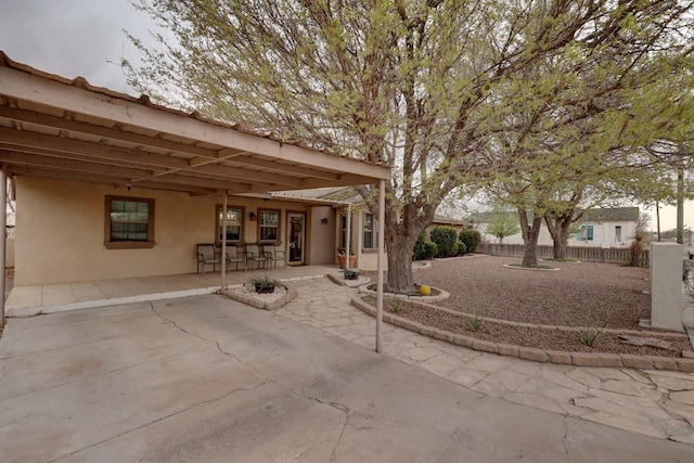 104 E 3rd St, Marfa, TX 79843 - view of patio featuring fence