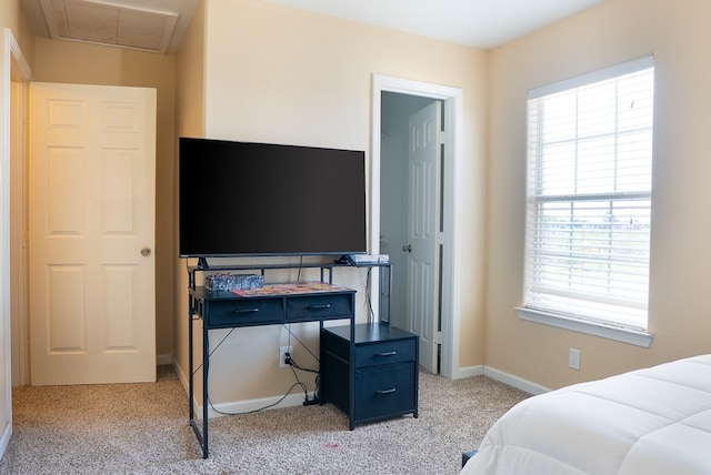 9540 W April St, Odessa, TX 79764 - bedroom with light colored carpet and multiple windows
