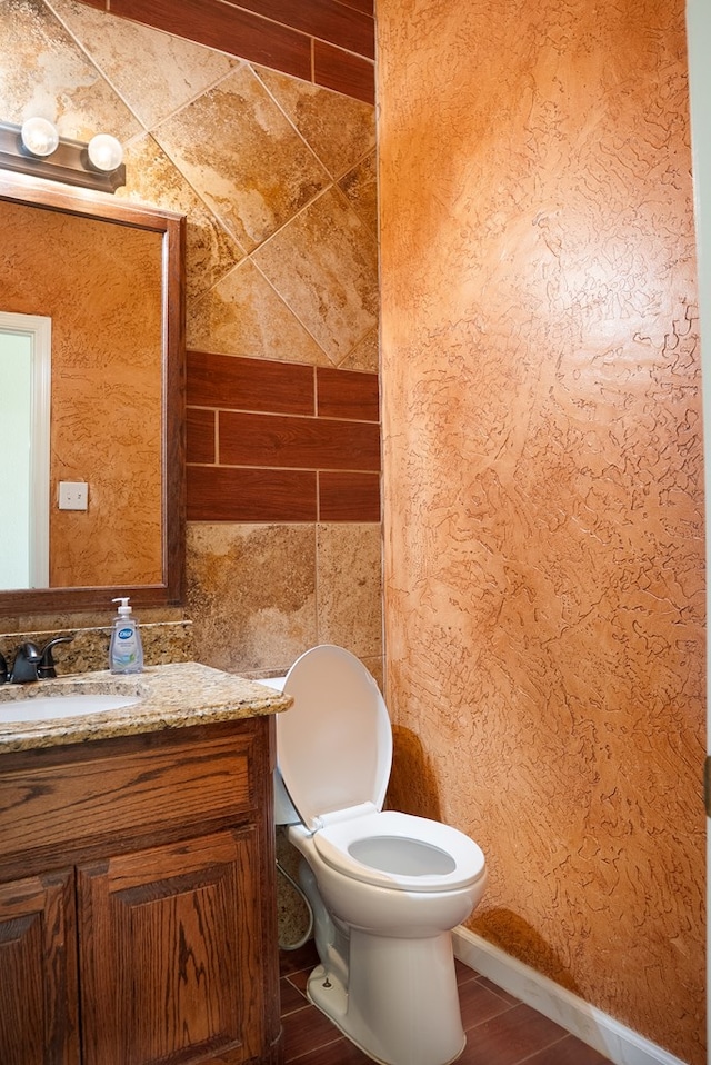 9540 W April St, Odessa, TX 79764 - bathroom with vanity and wood finished floors