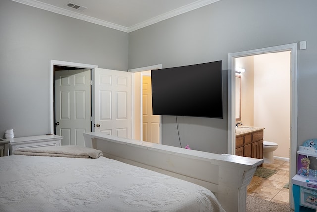 9540 W April St, Odessa, TX 79764 - bedroom featuring crown molding and ensuite bath