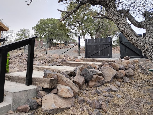 view of yard with a gate and fence