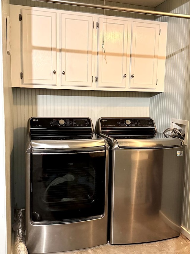 2003 N Enfield Rd, Alpine, TX 79830 - laundry area featuring cabinet space and separate washer and dryer