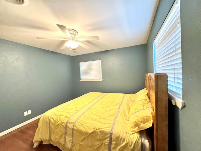 2003 N Enfield Rd, Alpine, TX 79830 - carpeted bedroom with baseboards and a ceiling fan