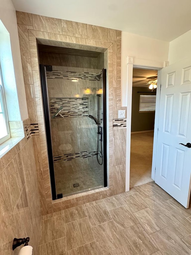 2003 N Enfield Rd, Alpine, TX 79830 - bathroom featuring a stall shower and ceiling fan