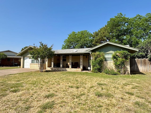2003 N Enfield Rd, Alpine, TX 79830 - ranch-style home featuring driveway, a garage, brick siding, and covered porch