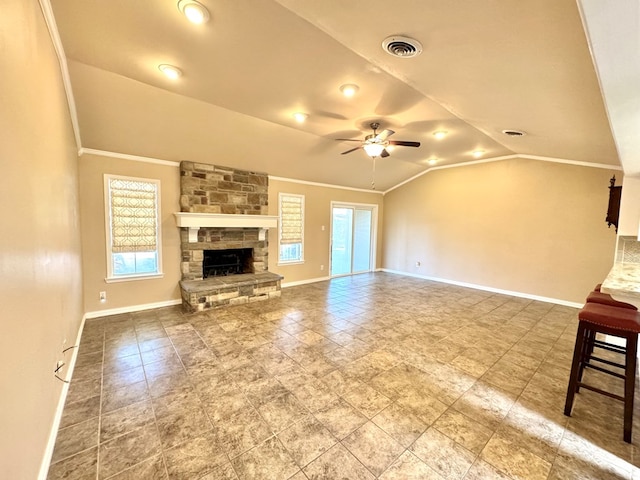 2003 N Enfield Rd, Alpine, TX 79830 - unfurnished living room with lofted ceiling, crown molding, ceiling fan, baseboards, and a fireplace